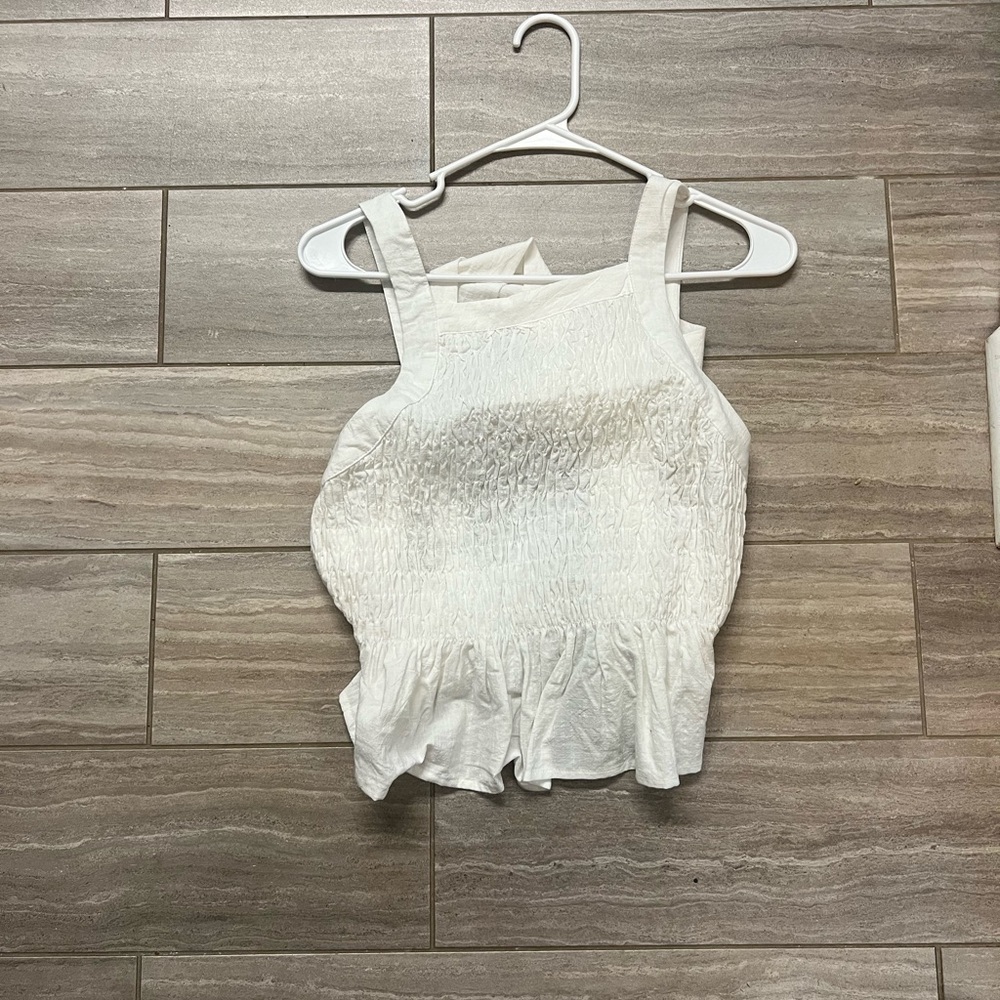 Ivory smocked tie back sleeveless top